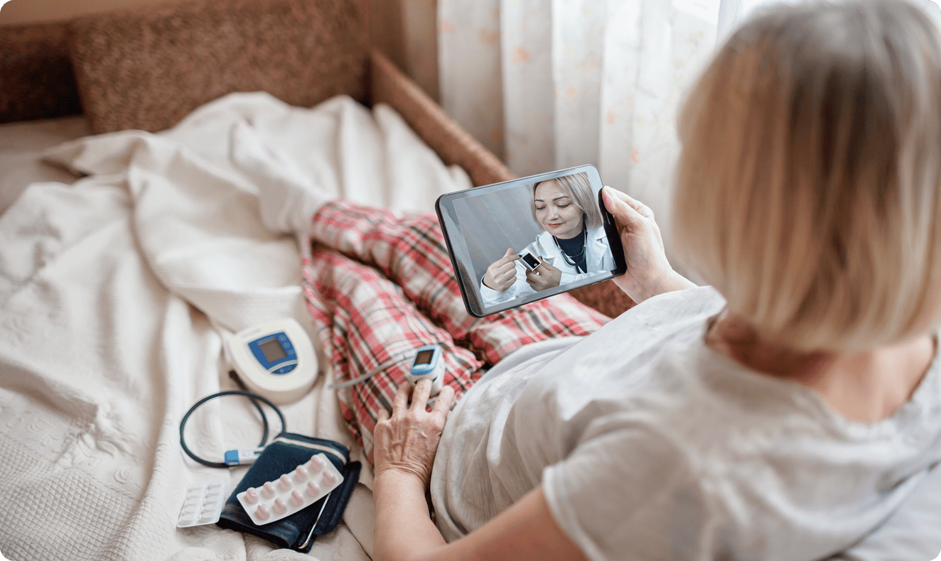 Senior woman telehealth consult with medical devices